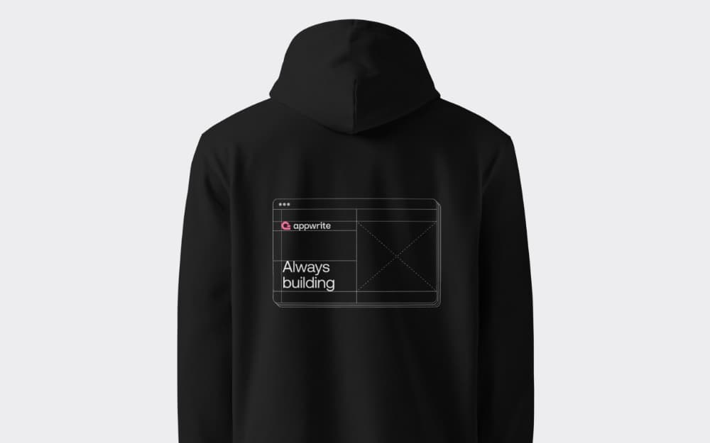 The back of a black Appwrite hoodie printed with “Always building”